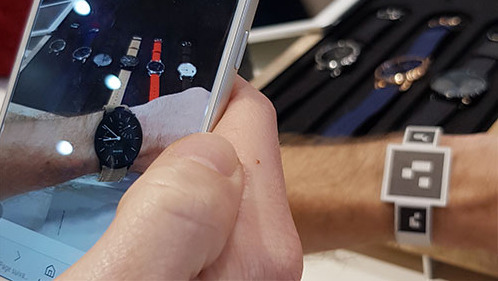 3D technology: Man trying on a watch virtually on his phone
