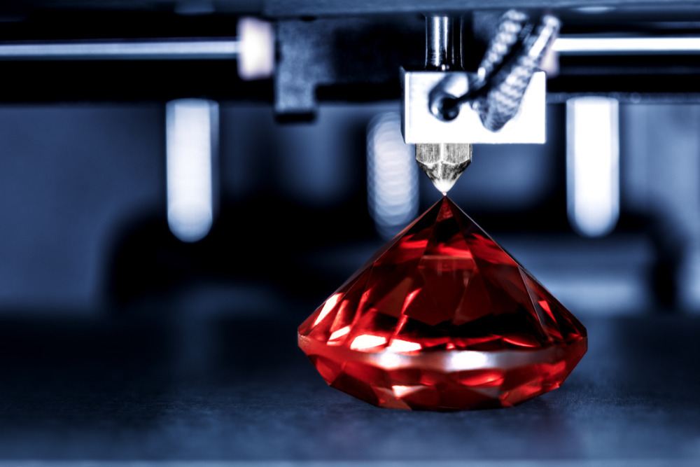 print-on-demand jewelry: Gemstone being customized using a 3D printer