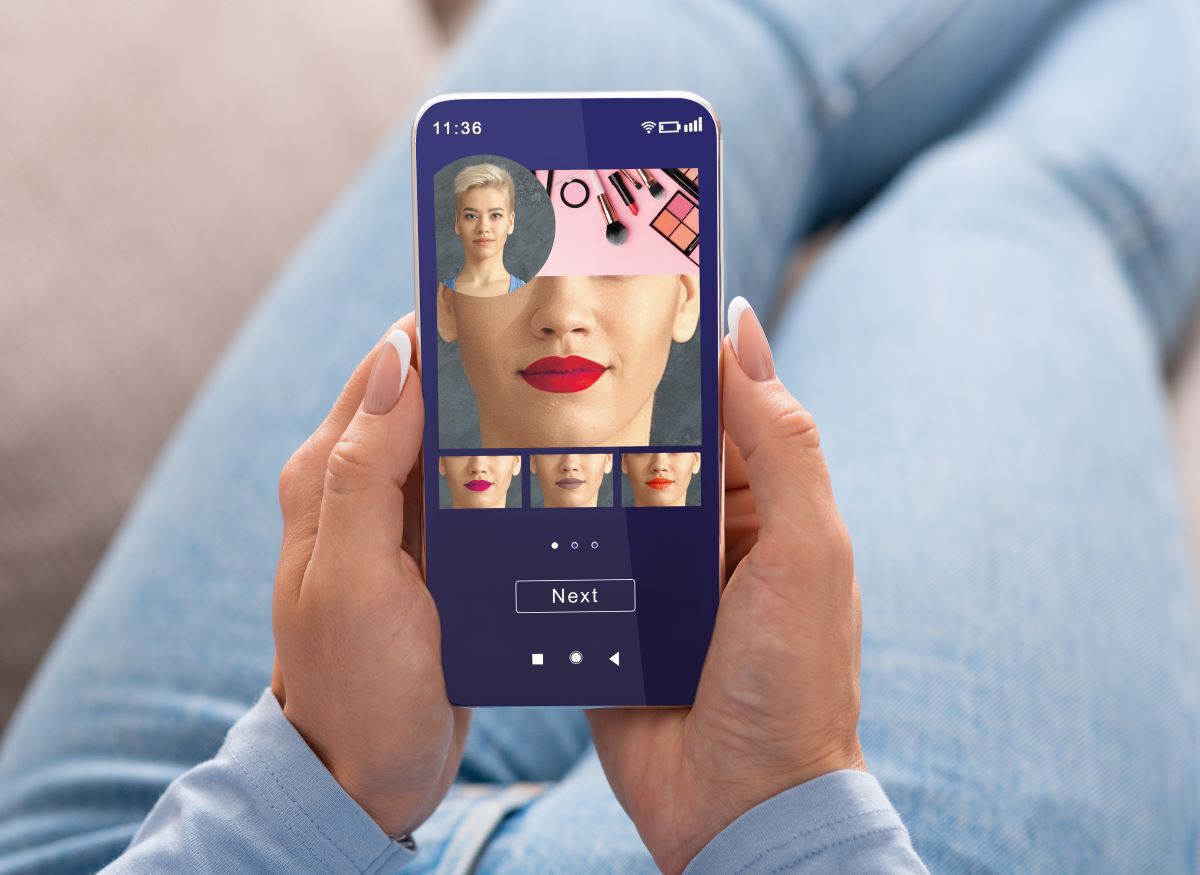 Woman trying on lipstick colors through smartphone